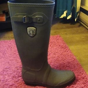 Knee high rain boots